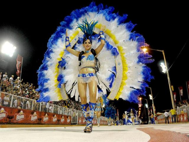 Dancers perform during carnival in Encarncion 375 km south of Asuncion. The "Llamadas" is Paraguay's biggest carnival parade, in which "comparsas," groups of dancers and drummers compete. AFP PHOTO Norberto Duarte