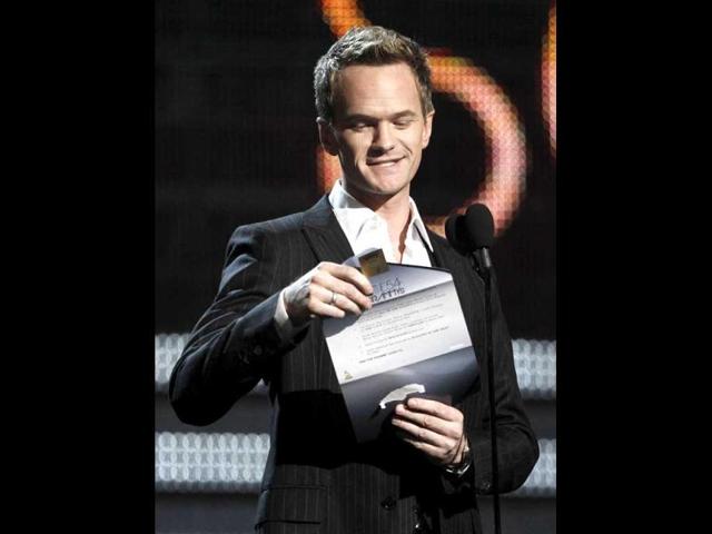 Neil Patrick Harris presents the award for song of the year during the 54th annual Grammy Awards in Los Angeles. (AP Photo)