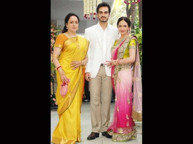 Hema Malini poses with daughter Esha Deol and son-in-law Bharat Takhtani at the duo's engagement.