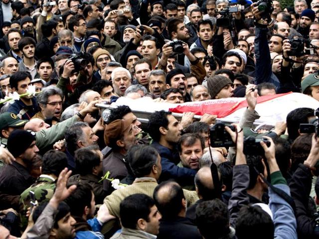 Nuclear scientist Massoud Ali-Mohammadi was killed by a remote-controlled bomb in Tehran on Jan 12, 2010. Iran described the physics professor as a nuclear scientist but a spokesman said he did not work for the Atomic Energy Organisation. Western sources said the professor worked closely with Mohsen Fakhrizadeh-Mahabadi and Fereydoun Abbassi-Davani, both subject to UN sanctions because of their work on suspected nuclear weapons development. In this file pic: Mourners carry the body of Massoud Ali-Mohammadi in northern Tehran on January 14, 2010. (Text & photo: Reuters)