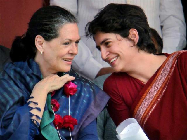 Priyanka Gandhi Vadra with her mother UPA Chairperson Sonia Gandhi at an election campaign rally in Raebareli. PTI Photo/ Atul Yadav