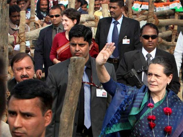 UPA Chairperson Sonia Gandhi waves as her daughter Priyanka Gandhi Vadra looks on during an election campaign rally in Raebareli. PTI Photo/Atul Yadav