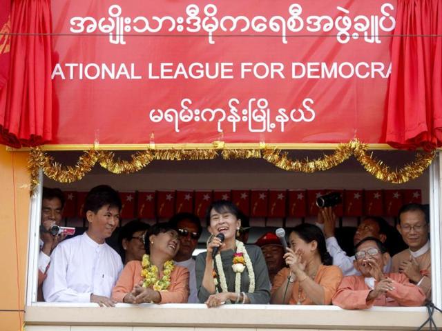 Pro-democracy leader Aung San Suu Kyi speaks to supporters during the opening ceremony of National League for Democracy party's Mayangon branch office in Yangon. Reuters/Soe Zeya Tun