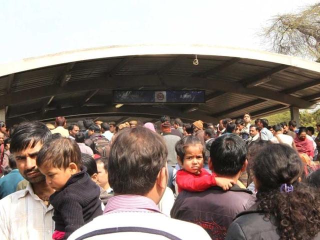 Delhi Metro passengers wait outside AIIMS metro station during a mock drill organised by Delhi Disaster Management Authority on earthquake-preparedness in New Delhi. HT Photo/ Arvind Yadav