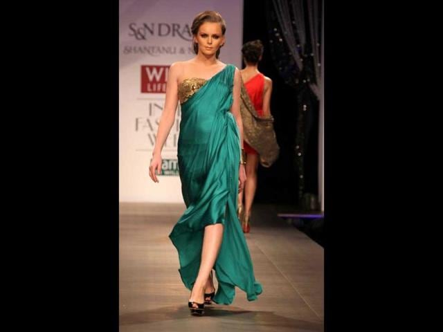 Olga Rymarenk walks the ramp for designer duo Shantanu-Nikhil.
