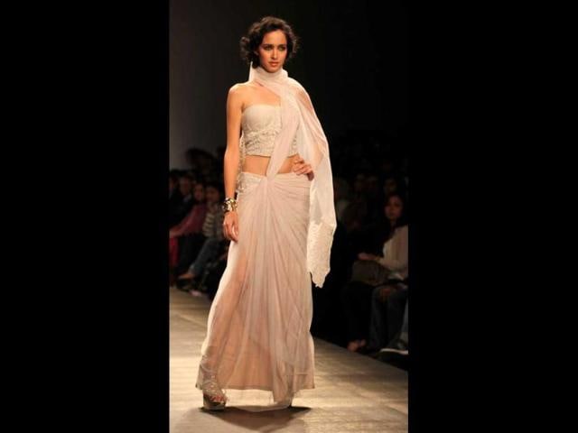 Model Tamara walks the ramp for designer duo Shantanu and Nikhil.