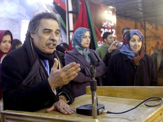 Ali Tarhouni, Libyan former National Transitional Council (NTC) minister for oil and finance, delivers a speech in Tahrir Square, near the court during a celebration to mark the first anniversary of revolutionary uprising against Muammar Gaddafi. Reuters/Esam Al-Fetori