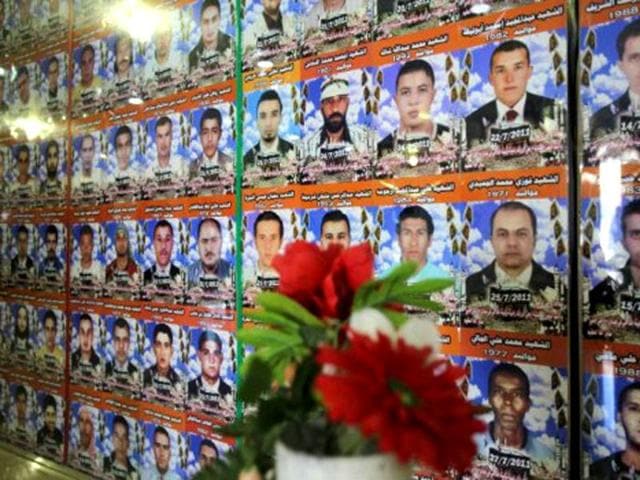 Pictures of those killed and wounded in the Misrata fighting are pasted on the walls of the museum on Tripoli Boulevard in Misrata. One year since the revolution against Muammar Gaddafi erupted, on February 17, 2011, Misrata - Libya's third largest city - is a clear example of the ferocity of the fighting. AFP/Mahmud Turkia