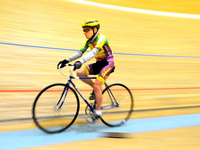 French cycling enthusiast and centenarian Robert Marchand rides to set a new record in the Master 100 years category on the track of the International Union Cycling in Aigle. AFP Photo/Sebastien Feval
