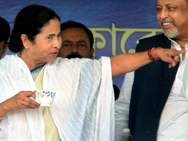 West Bengal chief minister Mamata Banerjee gestures during the foundation stone laying ceremony of a mega project for flood control on River Kaliaghai at Katakhali, East Midnapore. PTI/ Swapan Mahapatra