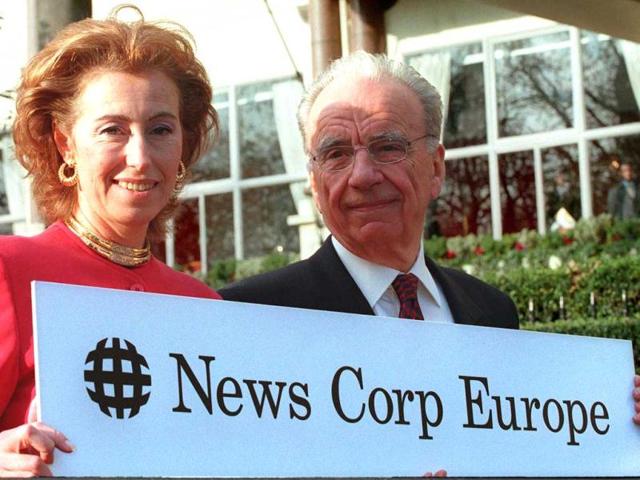 Rupert Murdoch, Chairman of News Corporation Limited stands beside the newly appointed Chairman of News Corp Europe, Mrs Letizia Moratti, outside a London Hotel where he announced the formation of News Corp Europe. PM/GB