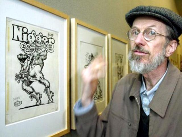 American-cartoonist-Robert-Crumb-shows-one-of-his-paintings-at-the-Museum-Ludwig-in-Cologne-Germany-in-this-file-photo-AFP-Torsten-Silz
