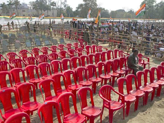 Chairs lie vacant in the foreground as less-than-expected supporters gather to listen to Prime Minister Manmohan Singh address an election rally in Kanpur. AP/Rajesh Kumar Singh