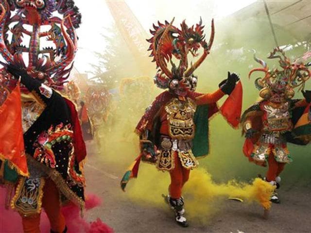 Dancers perform the traditional "Diablada" or Dance of the Devils during Carnival celebrations in Oruro, Bolivia. The Carnival in Oruro always opens with the "Diablada," a ritual dance of good and evil that has remained unchanged since colonial times. AP Photo/Juan Karita