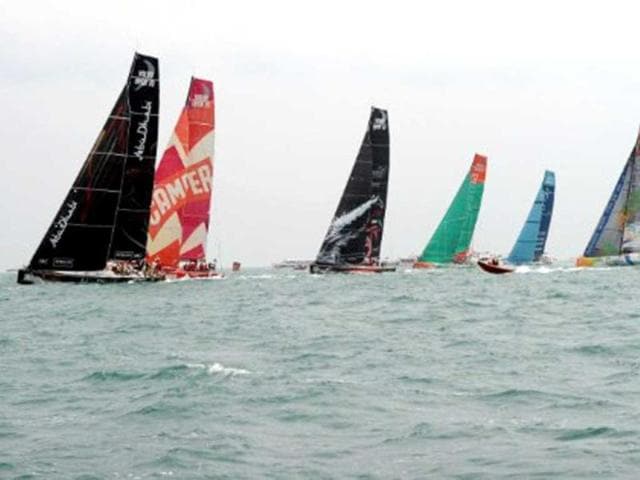 Teams start the In-Port-Race which was eventually won by Spain's Team Telefonica (R) on the eve of the Volvo Ocean Race departure from Sanya, Hainan Island. AFP Photo/Mark Ralston