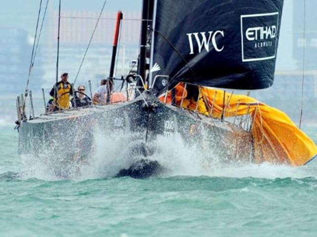 The Camper Team New Zealand yacht sails before finishing fourth during the In-Port-Race which was eventually won by Spain's Team Telefonica on the eve of the Volvo Ocean Race departure from Sanya, Hainan Island. AFP Photo/Mark Ralston