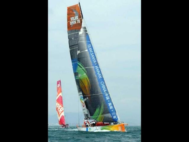 The Chinese Team Sanya yacht sails before finishing sixth during the In-Port-Race which was eventually won by Spain's Team Telefonica on the eve of the Volvo Ocean Race departure from Sanya, Hainan Island. AFP Photo/Mark Ralston