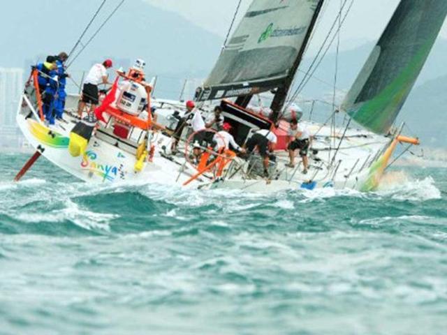The Chinese Team Sanya yacht sails before finishing sixth during the In-Port-Race which was eventually won by Spain's Team Telefonica on the eve of the Volvo Ocean Race departure from Sanya, Hainan Island. AFP Photo/Mark Ralston