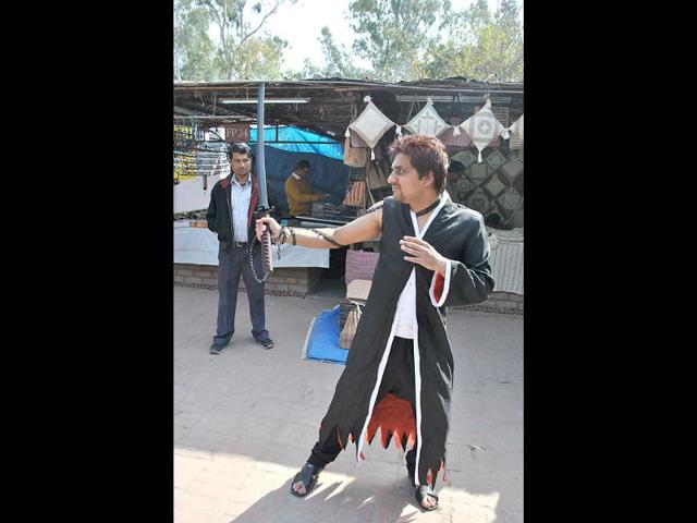 A participant dressed as a comic character during the 2nd annual Indian Comic Con in Delhi. HT/Divya Jain