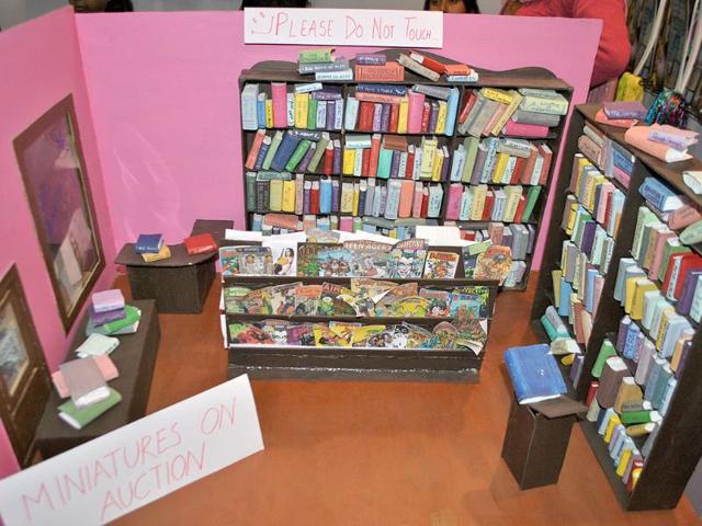 A miniature model of a library is seen at a stall during the 2nd annual Indian Comic Con in Delhi. HT/Divya Jain