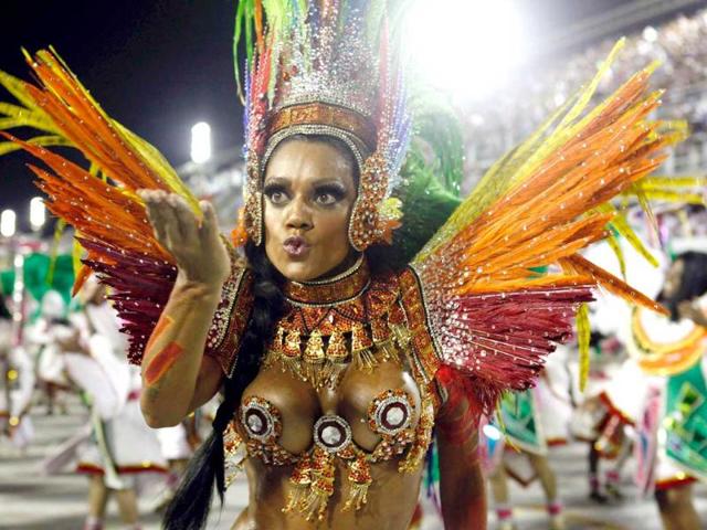 A reveller from the Mocidade samba school parades on the first night of the annual Carnival parade in Rio de Janeiro's Sambadrome. REUTERS/UNI PHOTO-4R