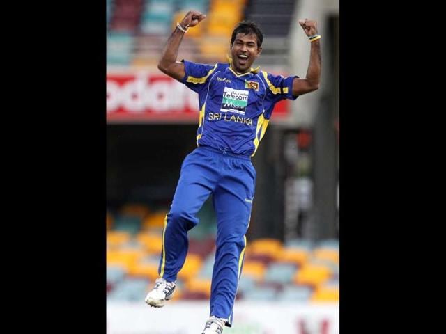 Sri Lanka's Nuwan Kulasekara celebrates after he got the wicket of Sachin Tendulkar during their One Day International cricket match in Brisbane. AP Photo/Tertius Pickard