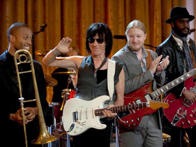 Troy Trombone Shorty Andrews (L), Guitarists Jeff Beck (2nd L), Derek Trucks (2nd R) and Gary Clark (R) play during a celebration of Blues music and in recognition of Black History Month as part of their In Performance at the White House series in Washington, DC. AFP/Jim Watson