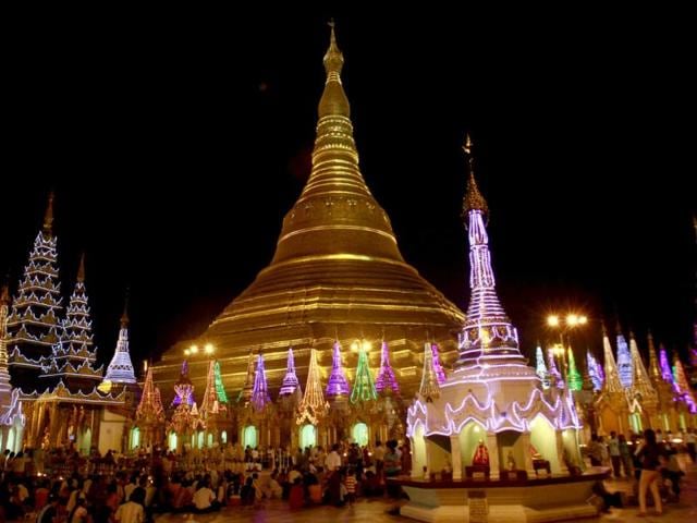Buddhist devotees prepare to cerebrate the 2,600 anniversary of Myanmar's land mark Shwedagon Pagoda's establishment in Yangon, Myanmar. AP/Khin Maung Win