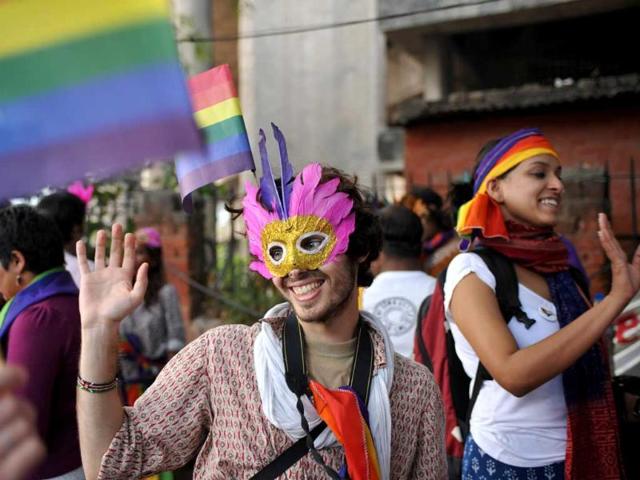 (File) Lesbian, gay, bisexual, transgender (LGBT) community members and supporters attend the fourth Delhi Queer Pride parade in New Delhi. Union home ministry urged the Supreme Court to reverse a landmark decision to decriminalise gay sex, saying homosexuality was immoral, "against nature and spreads HIV." AFP/Sajjad Hussain