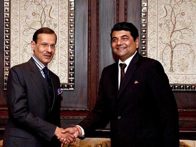 Saudi Arabia assistant minister for petroleum affairs Abdul Aziz Bin Salman bin Abdulaziz (L) shakes hands with Indian minister of state for petroleum and natural gas Ratanjit Pratap Narain Singh in New Delhi. AFP/Manan Vatsyayana