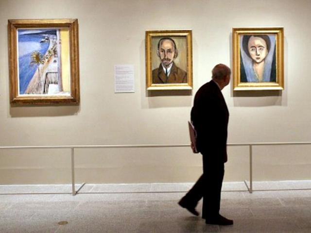 A man walks through a preview of 'The Steins Collect: Matisse, Picasso, and the Parisian Avant-Garde' at the Metropolitan Museum of Art in New York City. Spencer Platt/Getty Images/AFP