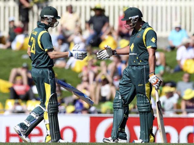 Australian-Captain-Michael-Clarke-left-congratulates-Peter-Forrest-after-he-reached-50-runs-in-the-one-day-international-cricket-match-in-Hobart-AP-Chris-Crerar