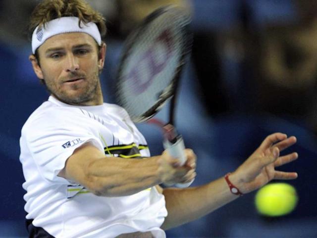 Mardy Fish of the US returns the ball to French Albano Olivetti, in the southern French city of Marseille, during the Open 13 tennis tournament. AFP/Boris Horvat