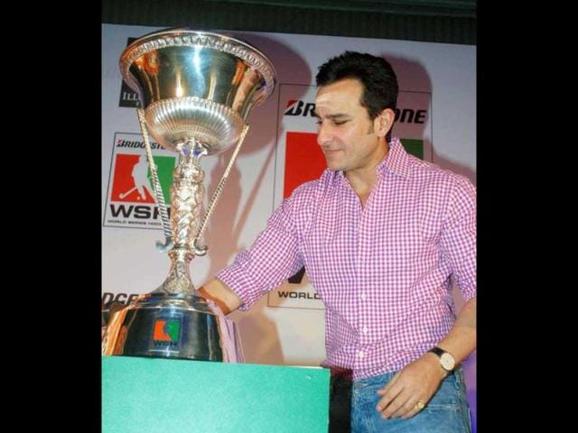 Saif Ali Khan onstage along with the trophy.