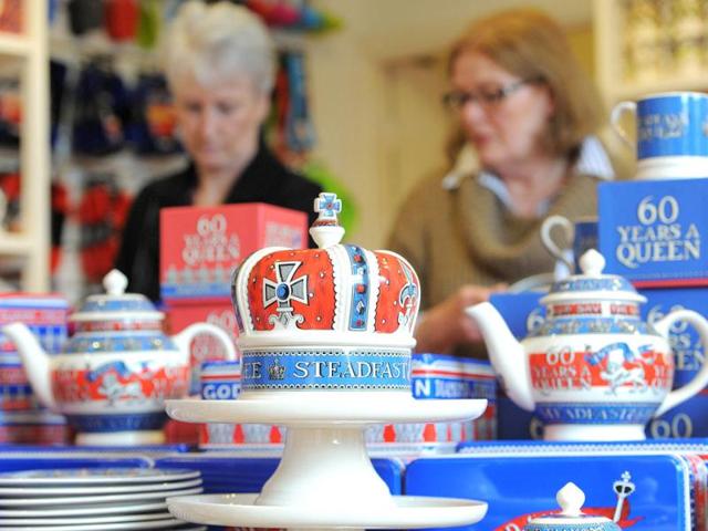 Pieces from the diamond jubilee collection are stacked up on sale at the Emma Bridgewater pottery in Hanley, Stoke on Trent, England. The diamond jubilee range will feature both hand decorated spongeware patterns and lithographed prints on celebratory mugs, bowls, plates, teapots and a ceramic crown emblazoned with the slogans ‘Sixty Years a Queen’ and ‘Steadfast and True. AFP PHOTO / Andrew Yates