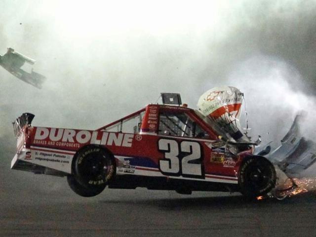 Miguel Paludo in his number 32 Chevrolet crashes during the NASCAR Camping World Series NextEra Energy Resources 250 truck race at the Daytona International Speedway in Daytona Beach, Florida. (Reuters)