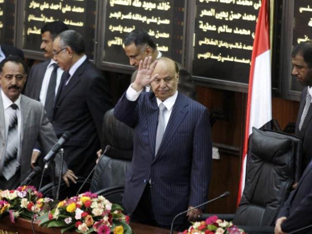 Yemen's newly elected President Abed Rabbu Mansour Hadi waves as he arrives to the Parliament in Sanaa, Yemen. Hadi took the oath of office before the country's parliament Saturday. He replaces Ali Abdullah Saleh, who ruled the country for 33 years before leaving office in a power transfer deal aimed at ending over a year of political turmoil. AP Photo/Hani Mohammed