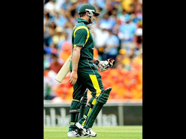 Australia's Peter Forrest leaves the field after being dismissed by Praveen Kumar during the one day international cricket match in Sydney. AFP/Greg Wood