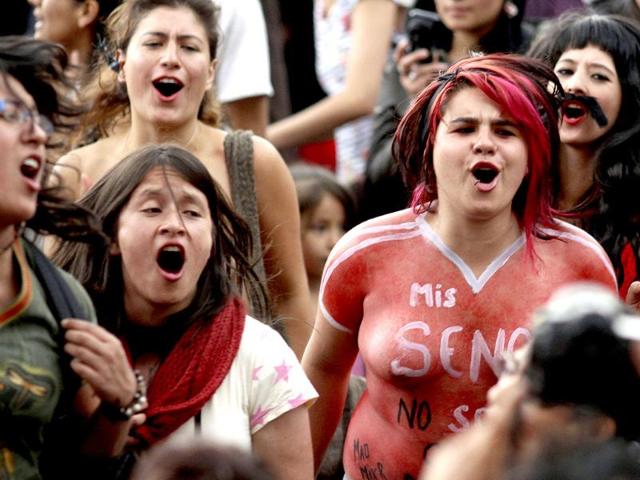 Members of the Network of Women take part in a 'March of the whores' to protest against discrimination and violence against women in Bogota. Reuters/Fredy Builes