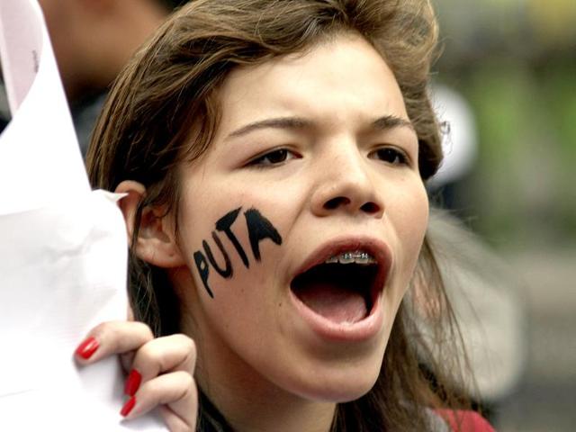 A woman with the word Whore written on her face, takes part in a 'March of the whores' to protest against discrimination and violence against women in Bogota. Reuters/Fredy Builes
