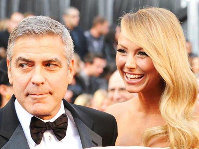 Actor George Clooney and Stacy Kiebler arrive at the 84th Annual Academy Awards held at the Hollywood Highland Center. (AFP)