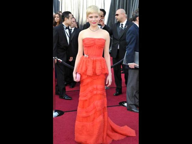 Actress Michelle Williams arrives on the red carpet for the 84th Annual Academy Awards. (AFP)