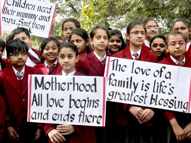 School children holding placards during a demonstration for the return of two children currently under the care of Norwegian social workers outside the Norwegian embassy in New Delhi. (PTI / Atul Yadav)