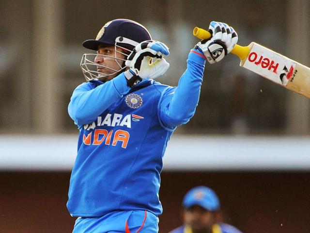 Virender Sehwag hits out against the Sri Lankan bowling in their international one day cricket match played in Hobart. AFP Photo/William West