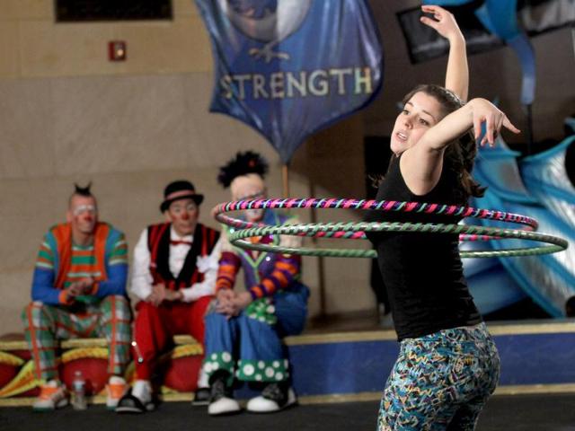 Auditioner Shlomit Oren performs during Ringling Bros. and Barnum & Bailey circus "Clown College" auditions at Grand Central Terminal in New York City. Ringling Bros. and Barnum & Bailey circus performers were in the city promoting their new production "Dragons!". Mario Tama/Getty Images/AFP