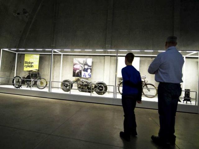 "Motorcycles" are displayed as people visit the "100 Innovations" exhibition at the Tekniska Museet, The National Museum of Science and Technolagy in Stockholm. The National Museum of Science and Technology has put the Swedish people to the task of singling out the 100 most important innovations of all time. In statistically significant studies, adults and Year 6 pupils were asked to cast their votes for the most important inventions in history. AFP PHOTO/JONATHAN NACKSTRAND