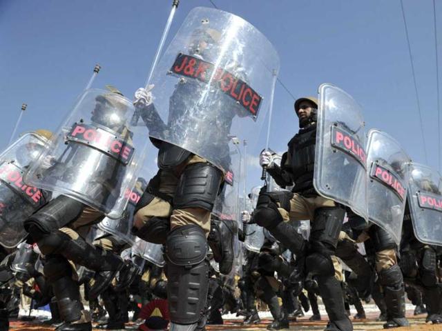 Riot police from the Jammu and Kashmir Armed Police (JKAP) participate in a passing out parade at The Manigam Ganderbal Training Centre at Ganderbal some 34kms northeast of Srinagar. The mountainous, Muslim-majority region of Kashmir was split in two in the aftermath of independence on the subcontinent when British rule ended in 1947. Both India and Pakistan claim the whole territory, which is divided by the de facto border known as the Line of Control. A separatist insurgency against Indian rule in the Himalayan state that began in 1989 has claimed more than 47,000 lives, according to official figures. Seperatists put the toll twice as high. AFP PHOTO/Tauseef MUSTAFA
