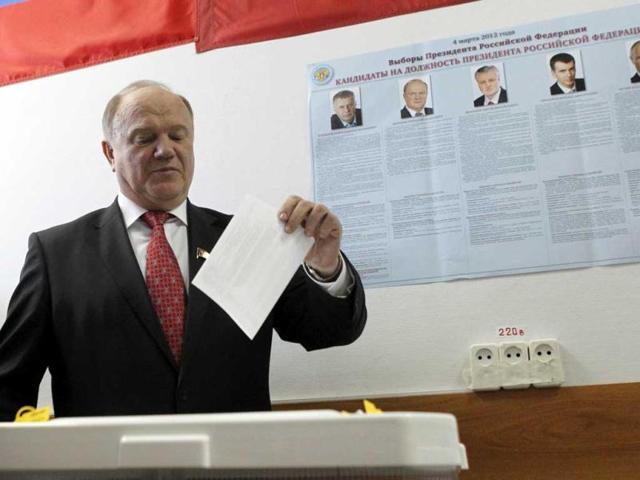 Communist party leader and presidential candidate Gennady Zyuganov casts his vote on an electronic ballot box in a polling station in Moscow. Reuters/Tatyana Makeyeva