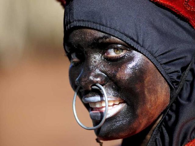 A performer takes part in an event marking the closing of carnival celebrations in the Malecon of Santo Domingo. Reuters/Ricardo Rojas