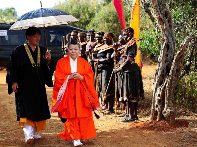 Head Priestess Shinso Ito of the Japanese esoteric Buddhist sect, the Shinnyo-en arrives at the Gallmann nature conservancy near Kinamba, Laikipia, Northern Kenya. Shinso Ito and a group of Shinnyo-en priests arrived in Kenya to perform a Buddhist fire and water ceremony for the first time ever in Africa.The ceremony was attended by over 300 spiritual leaders and was streamed live on the internet to millions of viewers and devotees globally. The ceremony involved Kenyan tribal elders and members of the Njemps, Pokot Samburu, Kikuyu and Turkana communites. AFP PHOTO/Carl de Souza